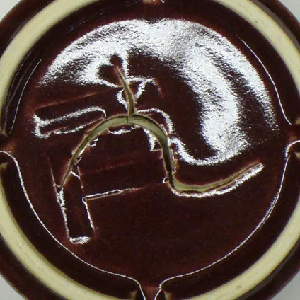 An example of an S-crack in the bottom of a fired porcelain mug