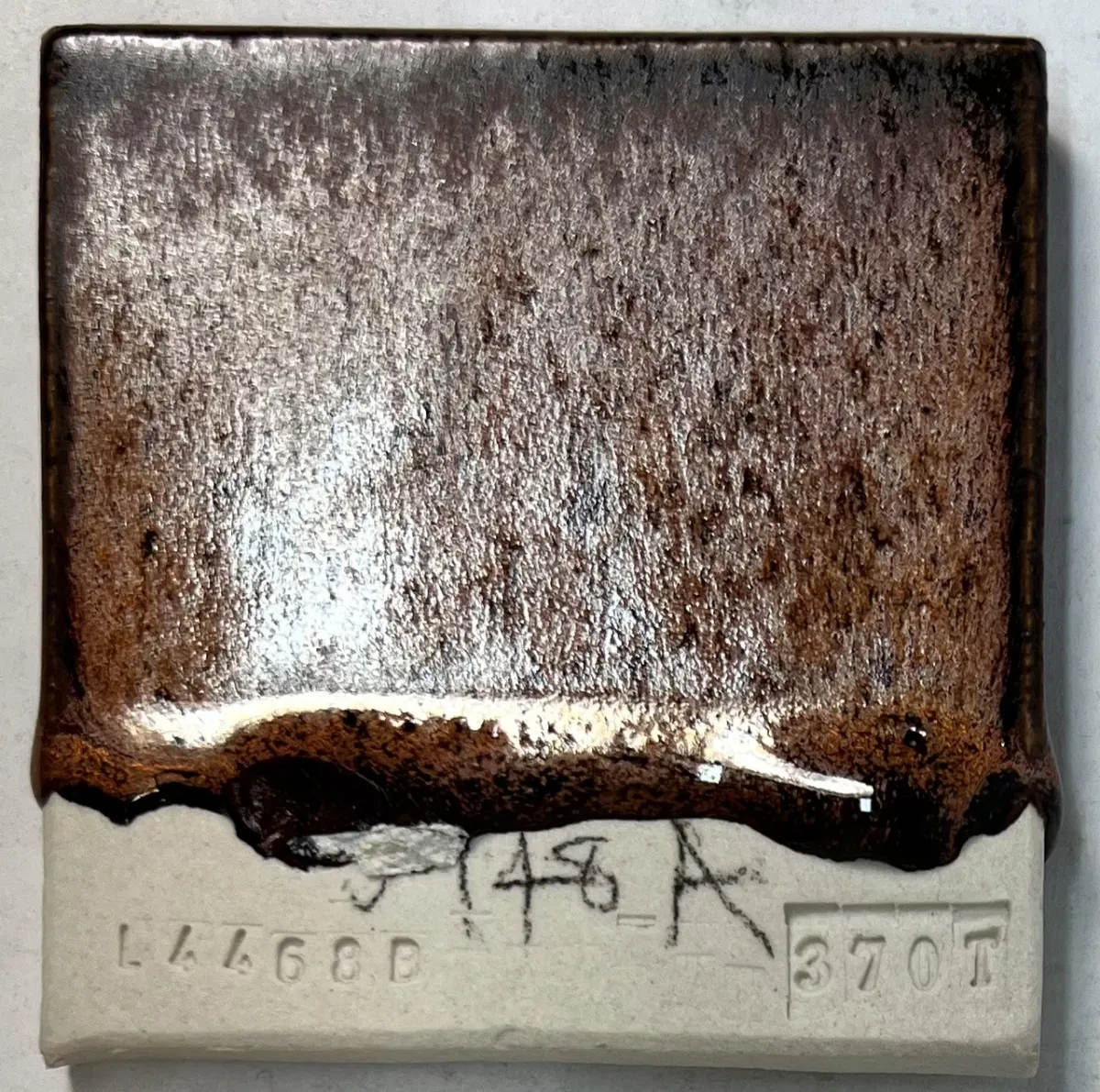 A runny pottery glaze