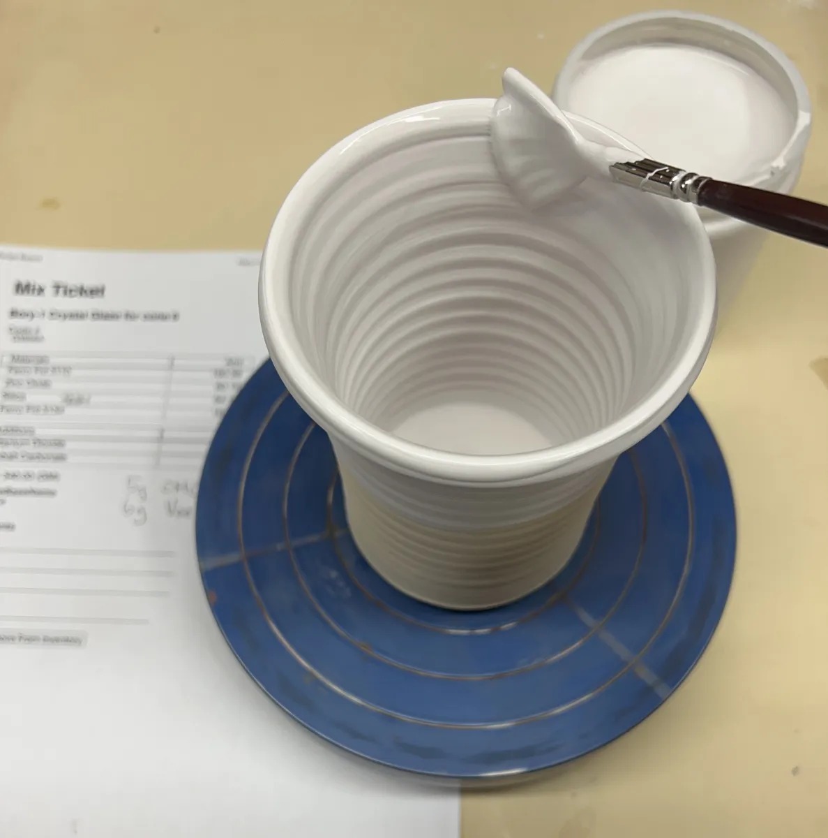 Brush application of crystal glaze