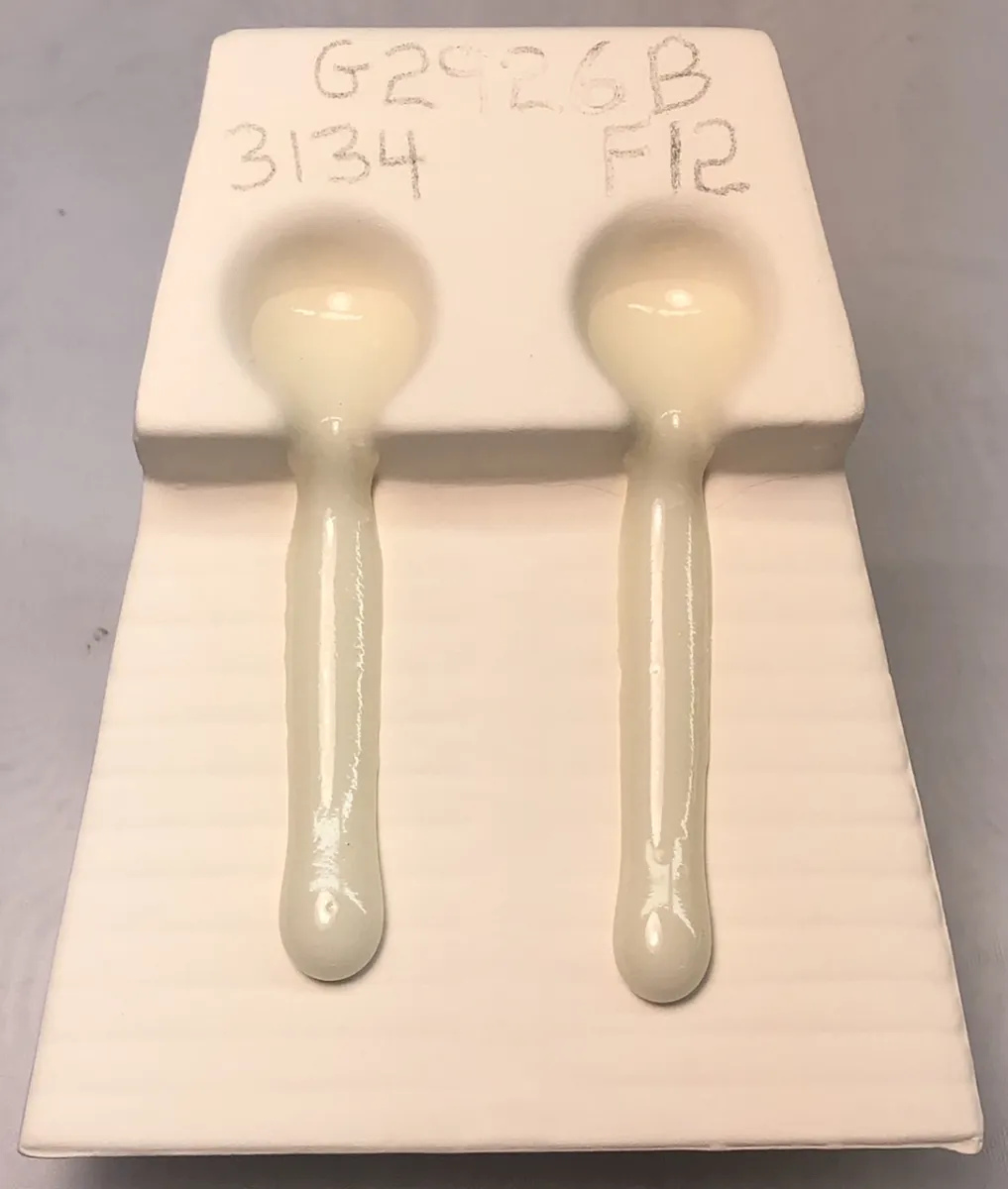 Melt fluidity tester comparing two versions of G2926B