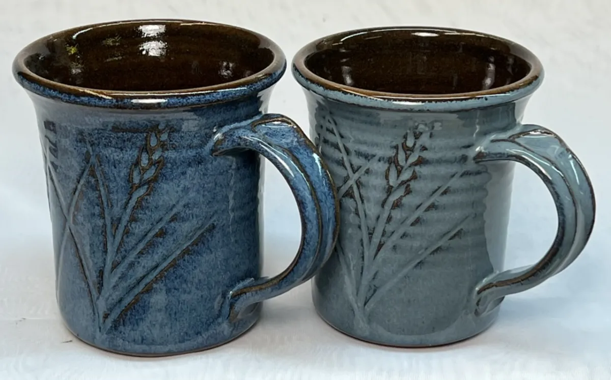 Two blue coffee mugs
