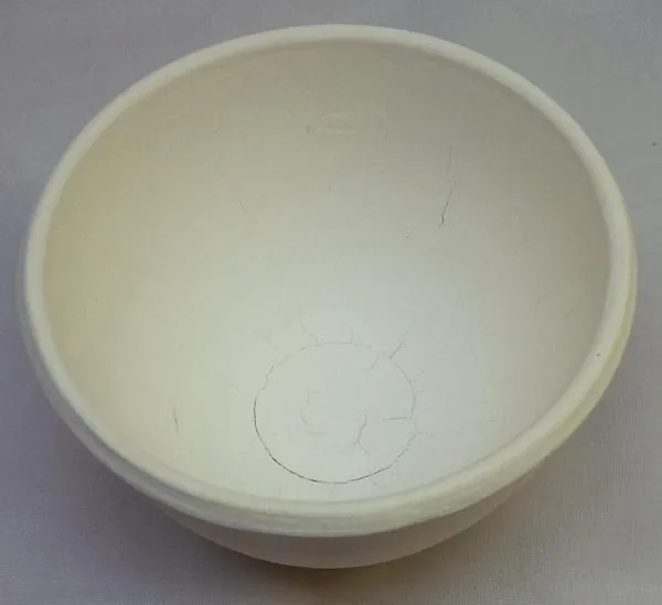 A small bowl thrown from pure kaolin