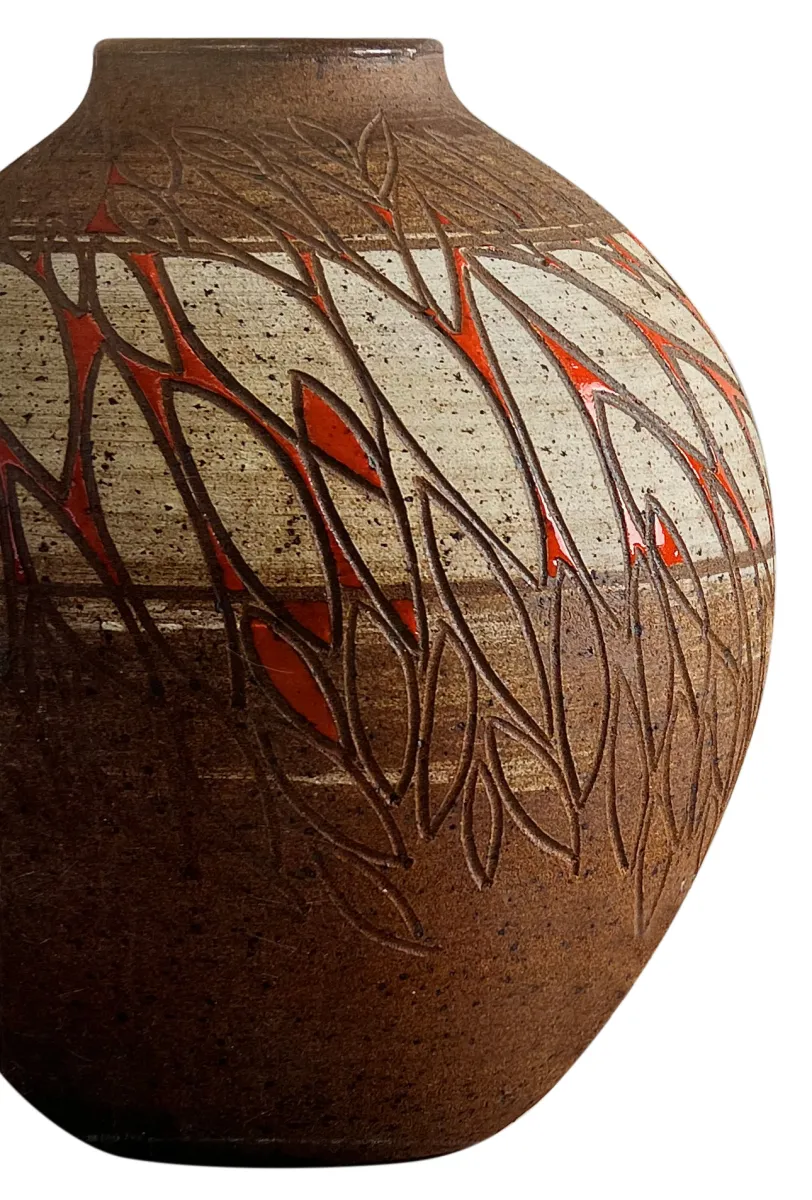 Incised iron reduction fired vase by Luke Lindoe