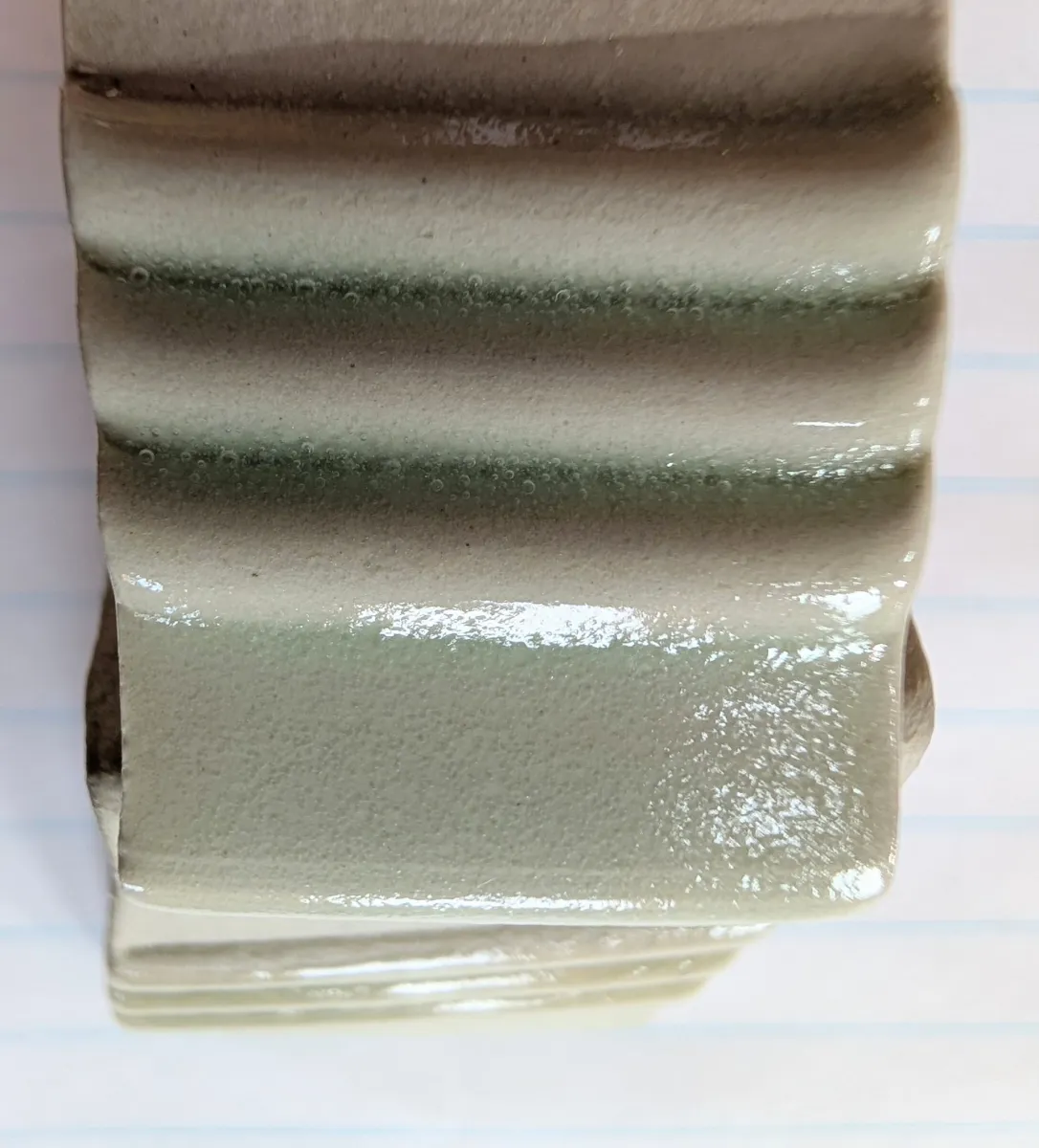 Why so many bubbles in a fritted cone 6 glaze?