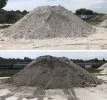 Two piles of raw clay behind the Plainsman Clays factory