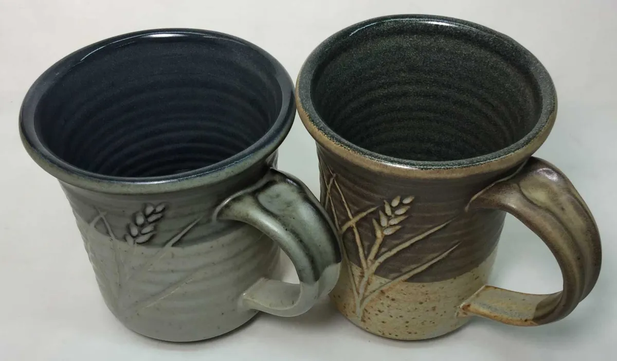 Transparent and RavenTalc silky matte glazes on black engobe at cone 10R