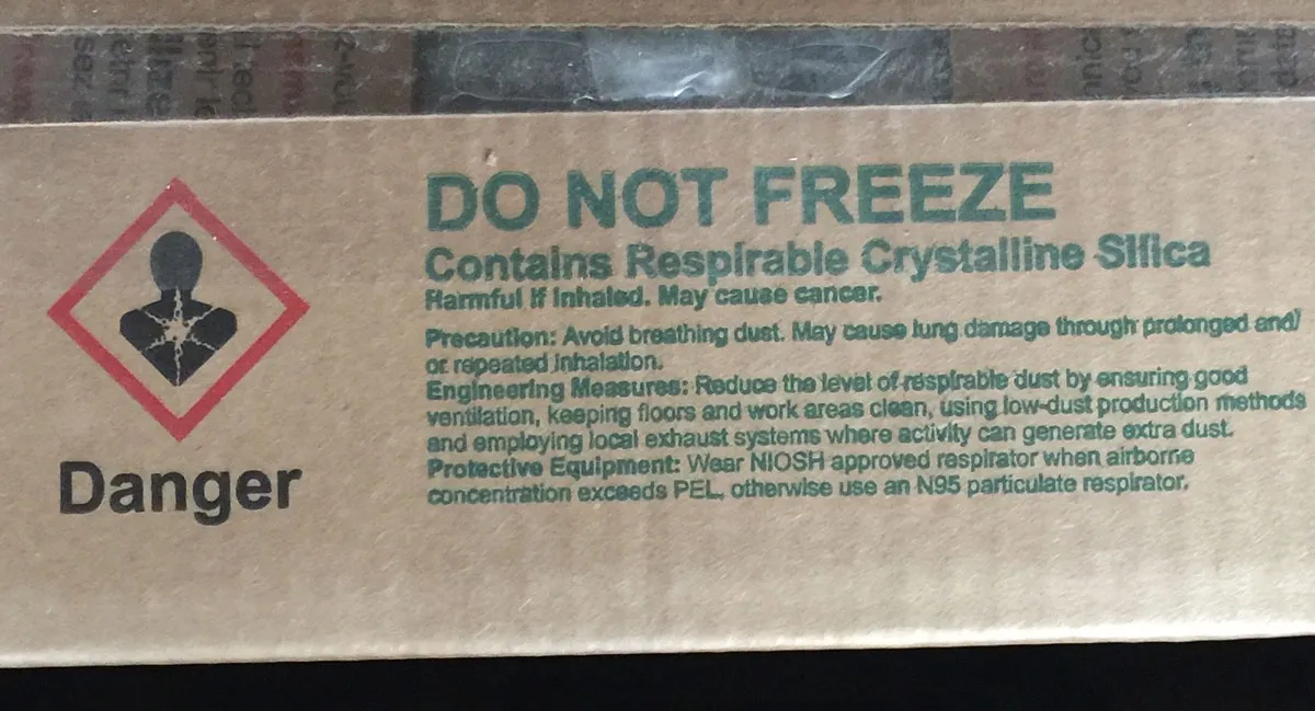 Crystalline silica warning on a box of clay