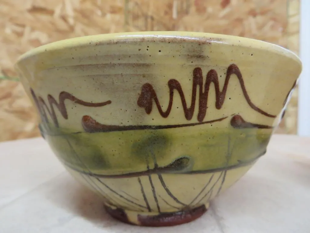Solving a pinholes problem with a boron fluxed cone 04 opacified and stained glaze