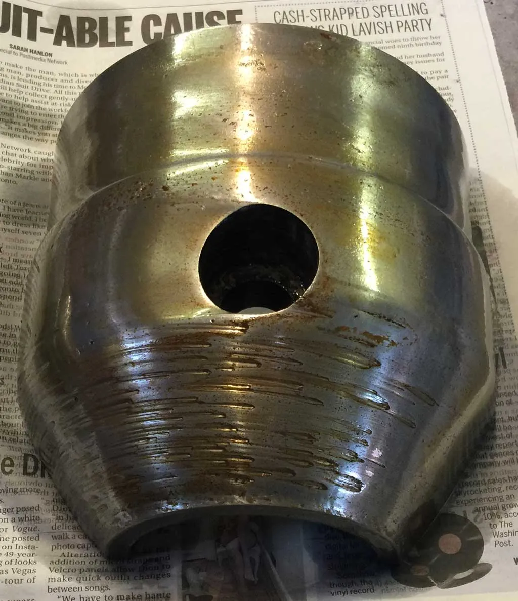 Wear that occurs on the stainless steel shaft casing of a pugmill