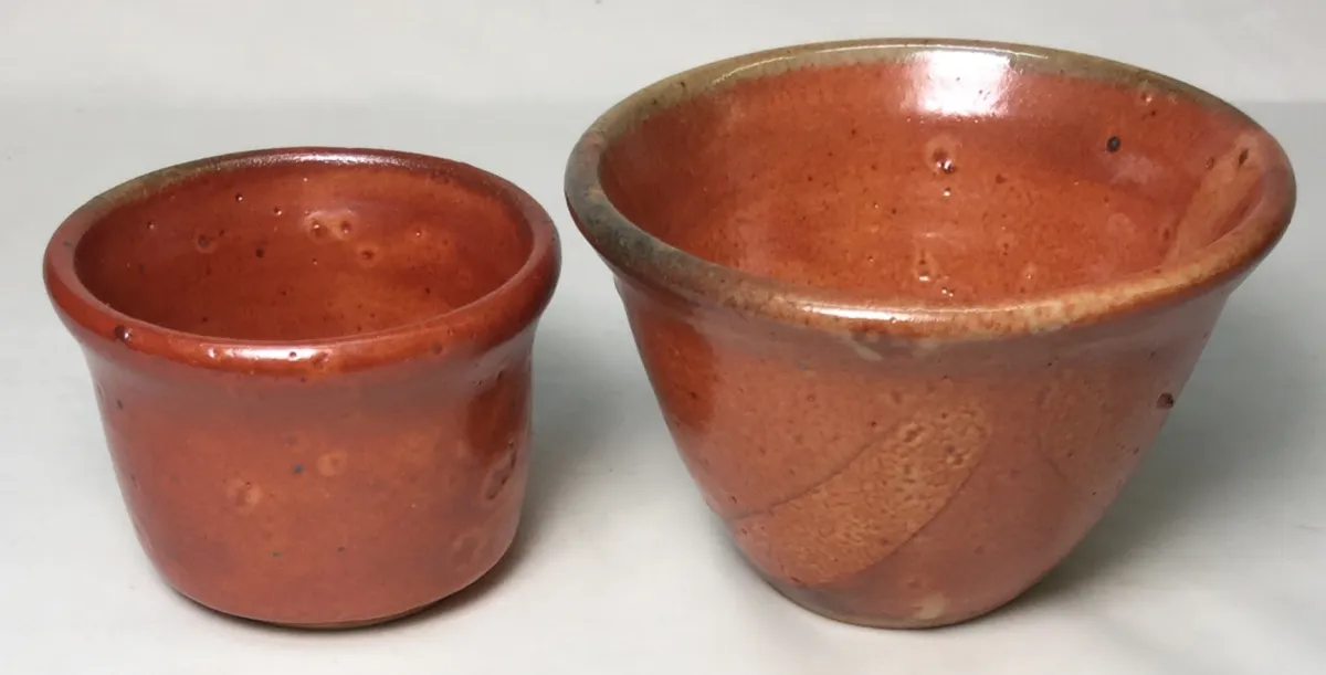 Two small brown, matte shino bowls