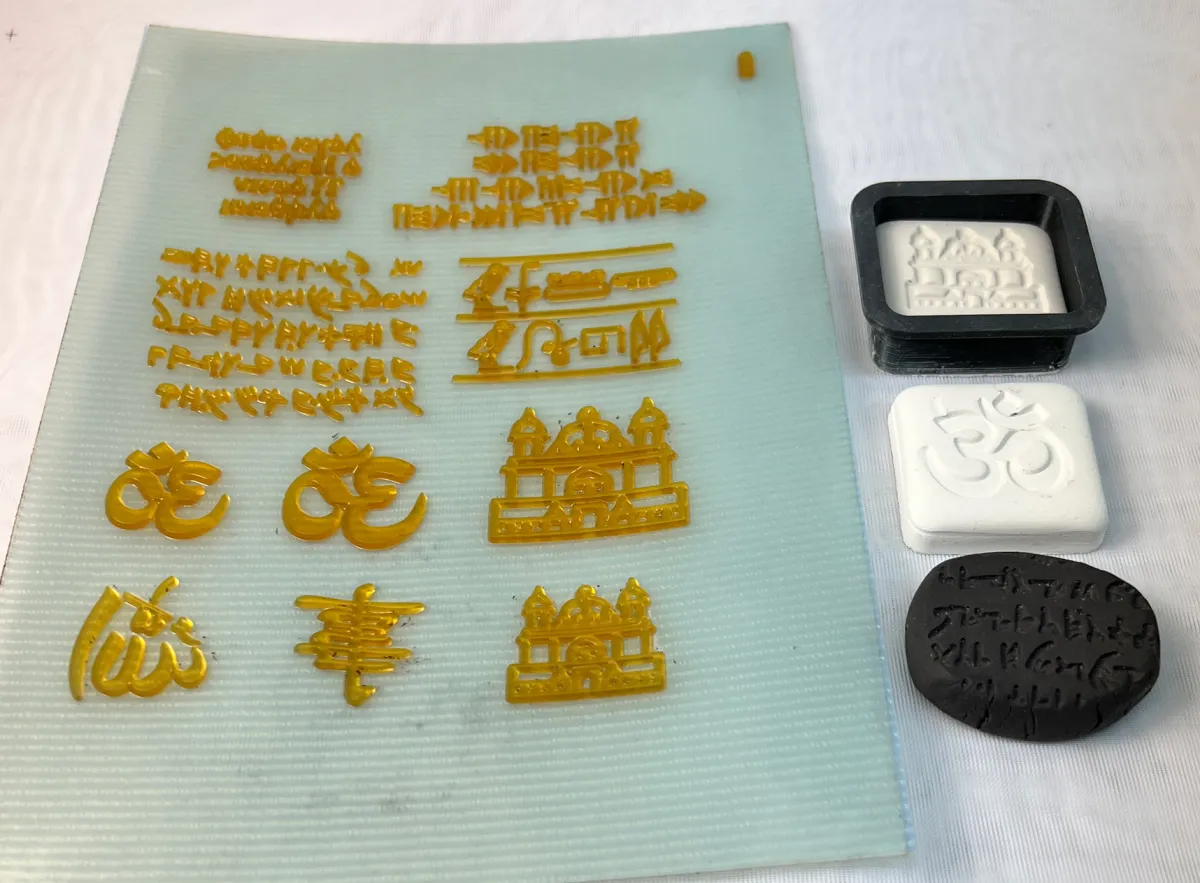 A variety of plastic letter-press printing plates.