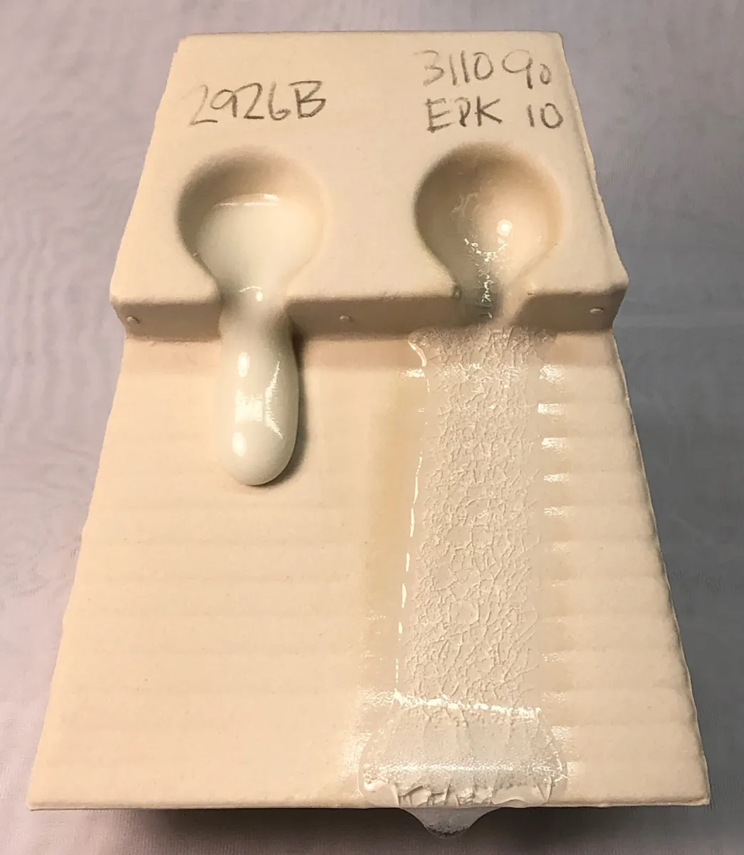 A melt flow tester showing how a normal glazes runs when melting compared to this one