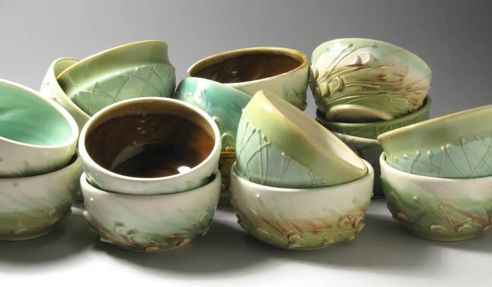 Bowls decorated with slip trailing