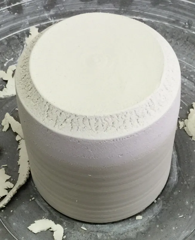 A body containing excessive non-plastics having a high bentonite addition for plasticity