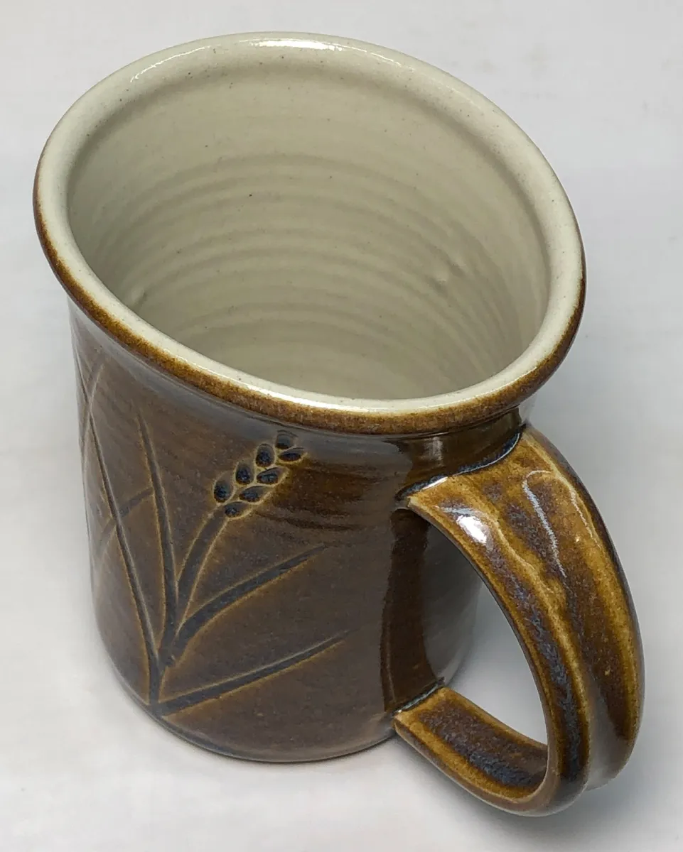 Severe fired warping when a low temperature clay goes to cone 6