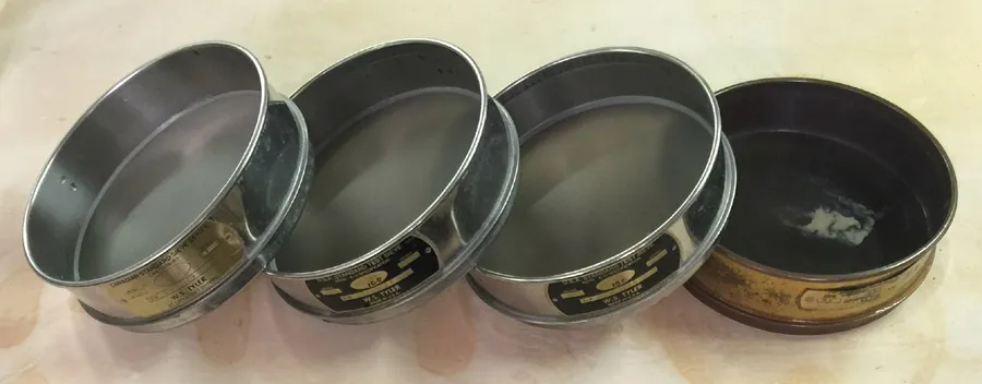 Test sieves drying on edge