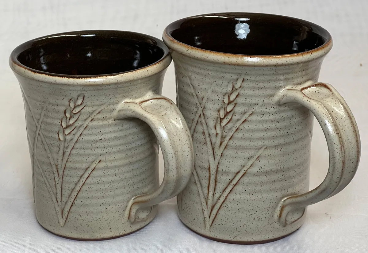 Two oatmeal glazed cone 6 mugs