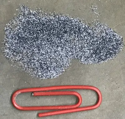 0.11g C-98 Talc residue on a 150 mesh screen from 50g