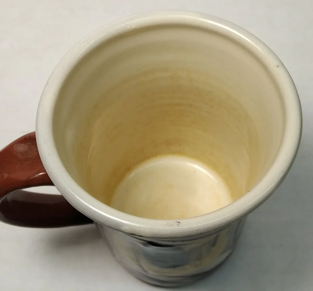 The white inside of a mug is coffee-staining