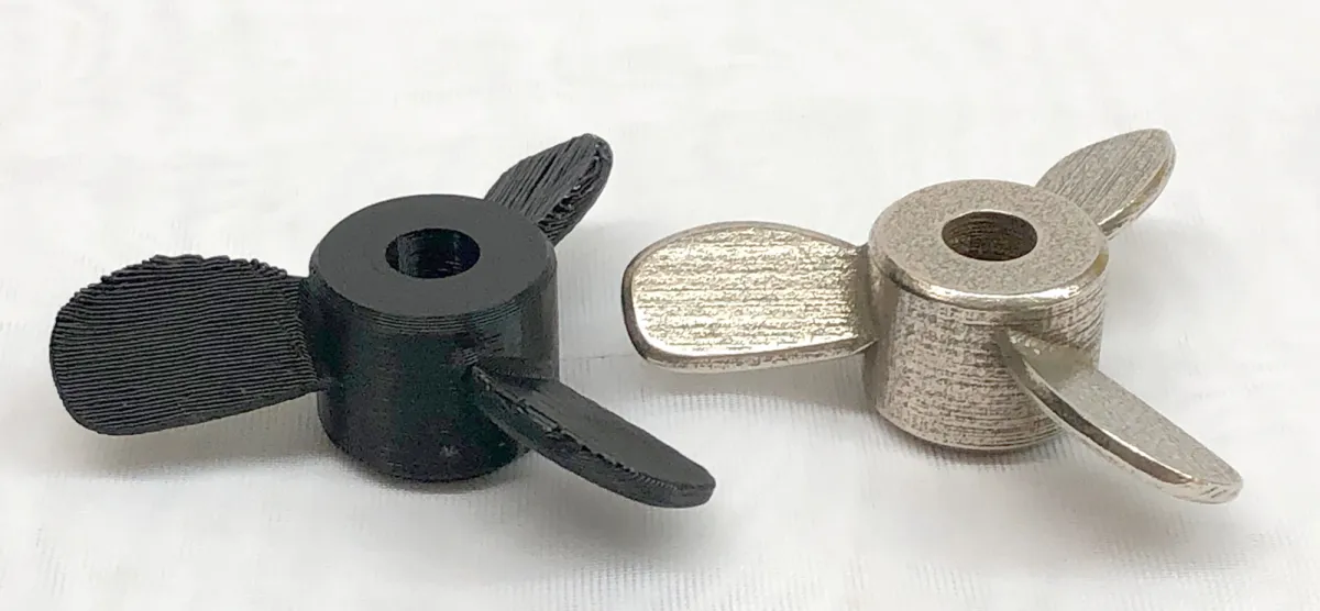 Plastic and stainless steel 3D printed propeller side-by-side