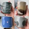 Four cast porcelain mugs with four different commercial glazes. All crazed!