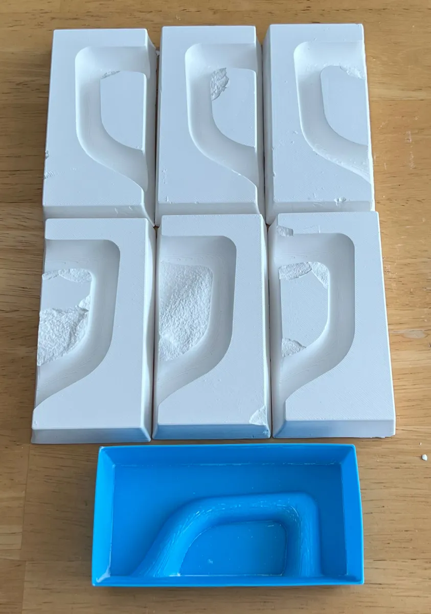 Failed 3D printed mug handle molds