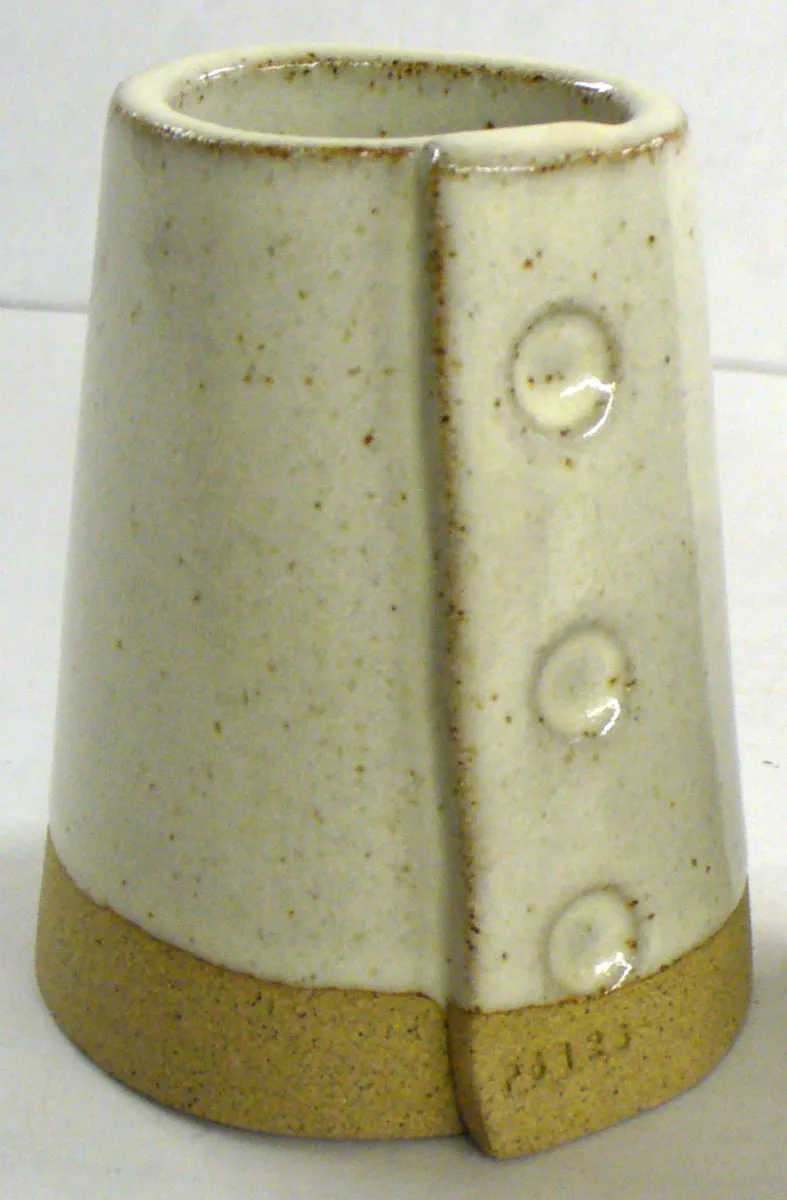 Ravenscrag Slip can make an interesting variegated ivory at cone 10