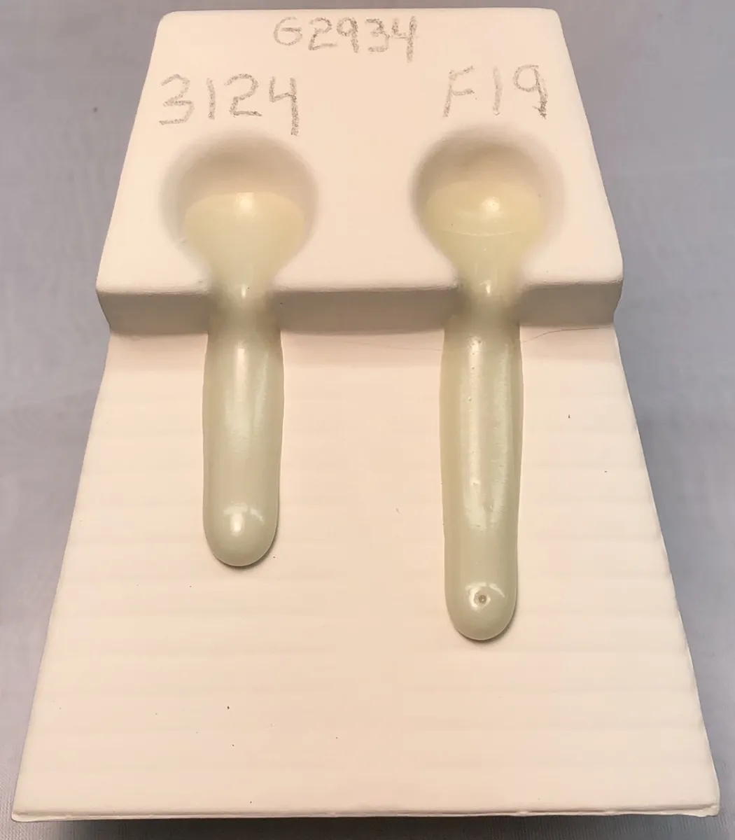Melt fluidity tester comparing two versions of G2934