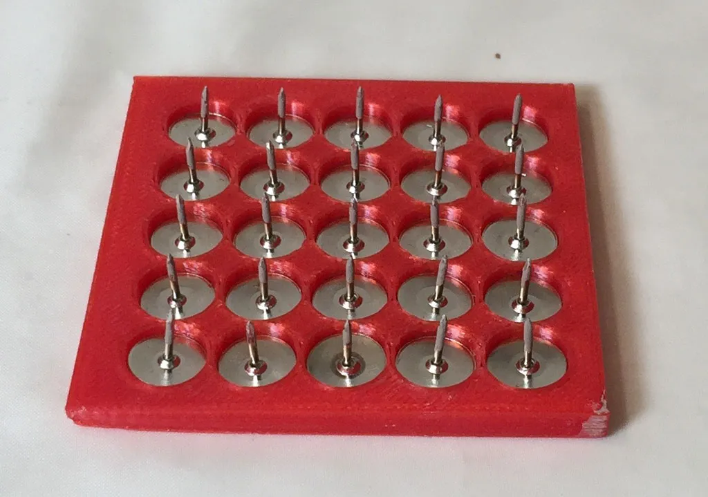 A tool I 3D-printed for holding leather hard pieces during engobe application