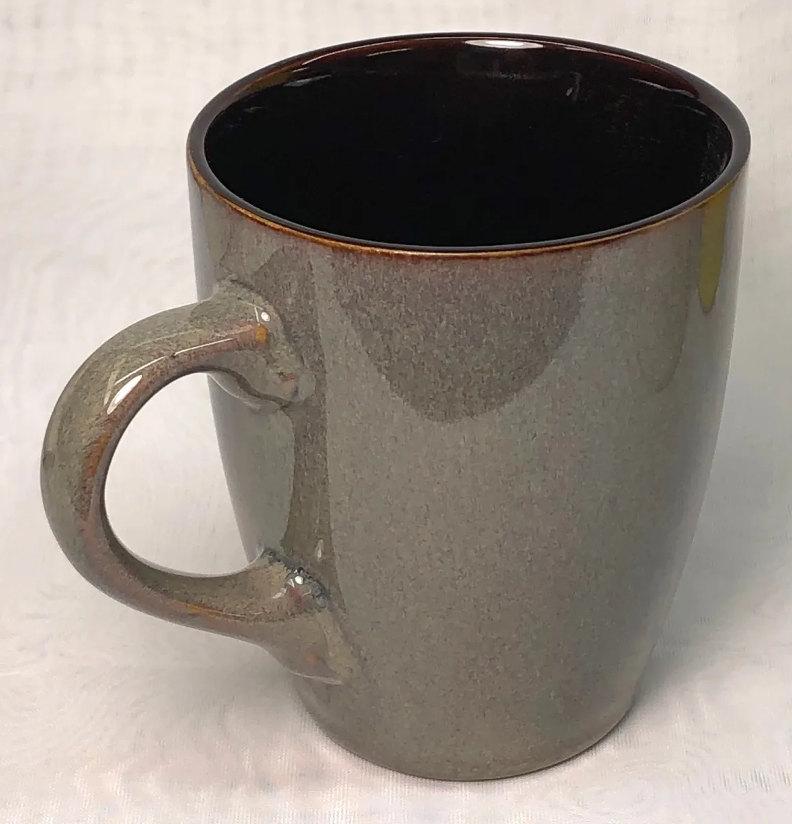 A commercial rutile-glazed mug